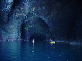 Kayaker Exit the Painted Cave